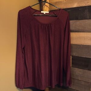 Burgandy/wine colored, textured comfy pull over top.